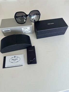 Prada Black Frame Sunglasses with Gray Gradient Lenses